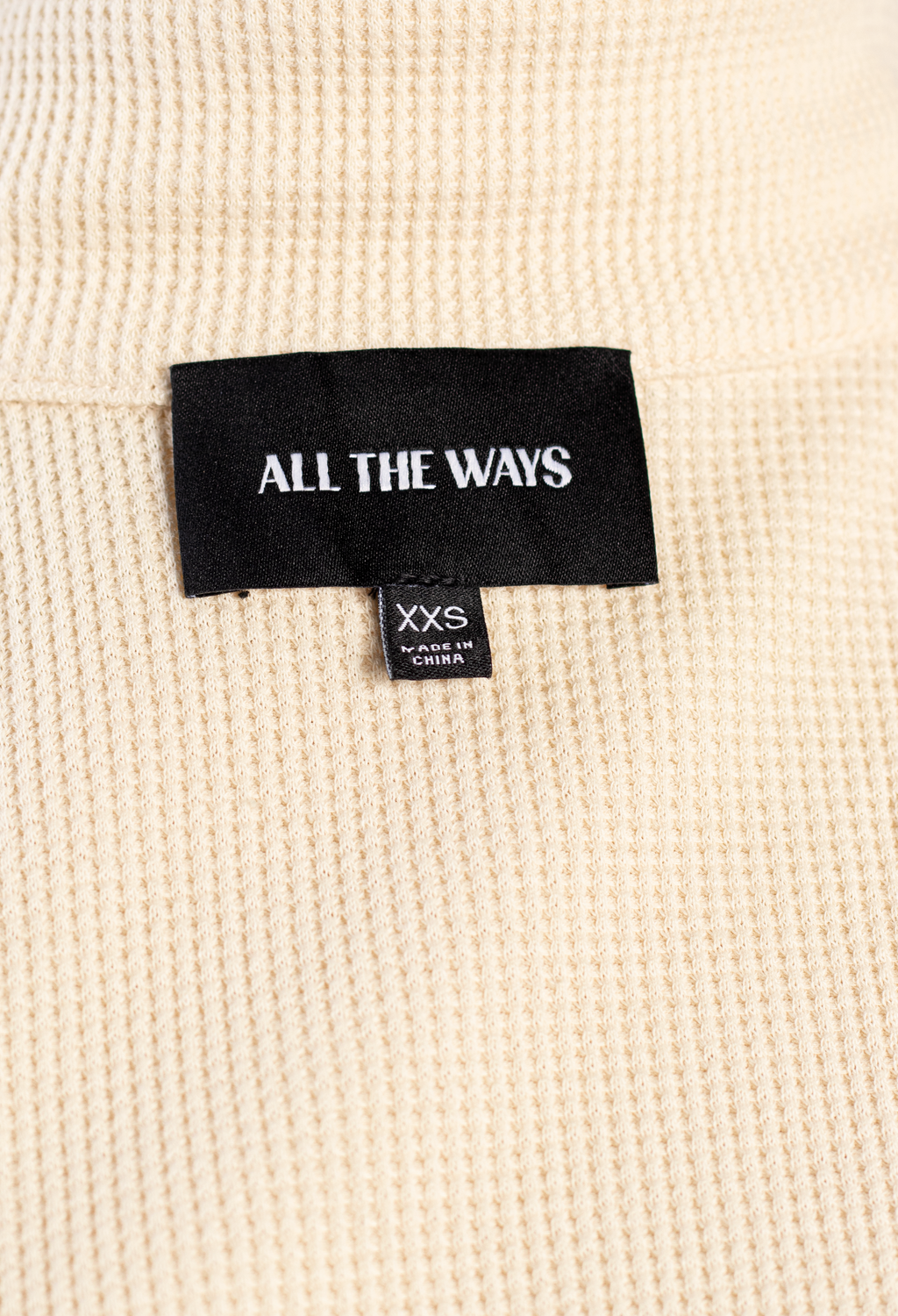 TOP DEEP V OVERSIZE CON CUELLO POLO