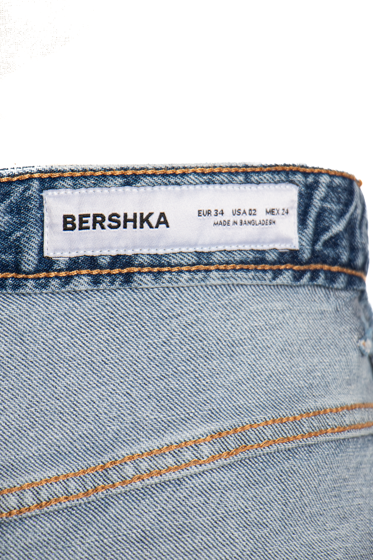 JEANS WIDE LEG CON CINTURA ASIMÉTRICA